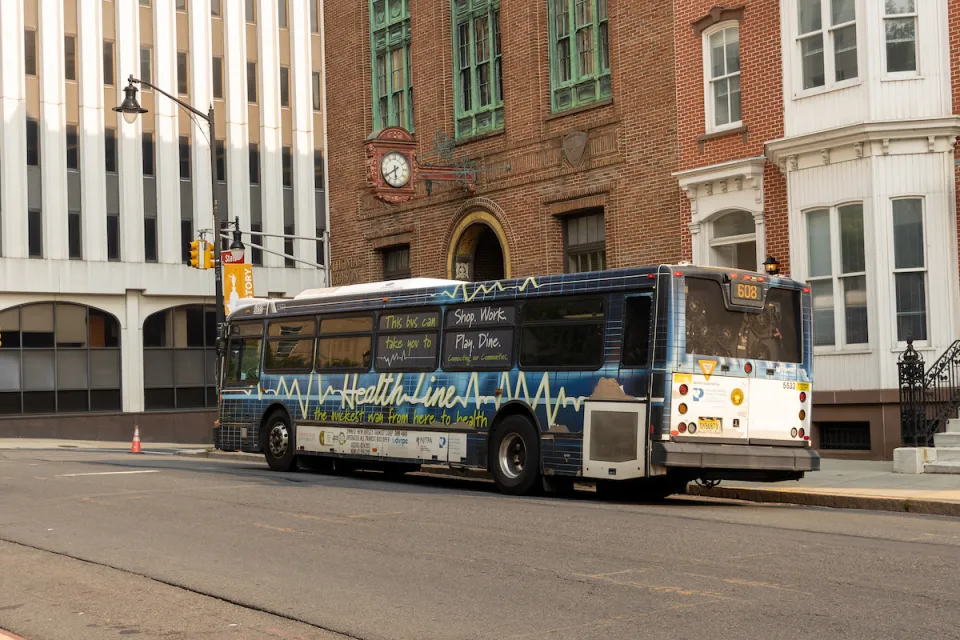 White and blue NJ Transit bus in Trenton, New Jersey.
